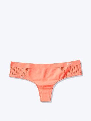 Трусики Victoria's Secret PINK стрінги помаранчеві XS / SEAMLESS THONG 1510221983 фото